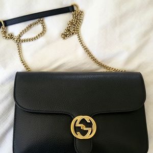 Gucci gold logo purse